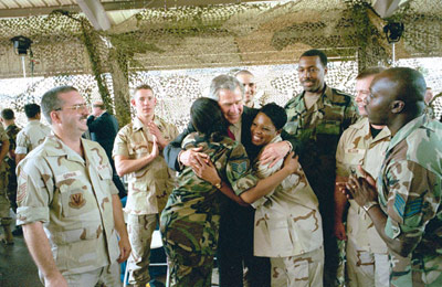 President George W. Bush greets military personnel at MacDill Air Force Base in Tampa, Fla., June 16, 2004. White House photo by Eric Draper