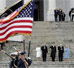 Escorted by Army Major General Galen Jackman, center, President George W. Bush, Laura Bush, Vice President Dick Cheney and Lynne Cheney salute the American flag from the U.S. Capitol steps before President Bush takes the oath of office for a second term as the 43rd President of the United States, Thursday, January 20, 2005. White House photo by Eric Draper