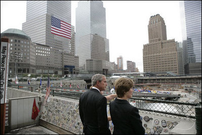 President George W. Bush and Laura Bush look over the World Trade Center site Sunday, September 10, 2006, during a visit to Ground Zero in New York City to mark the fifth anniversary of the September 11th terrorist attacks.