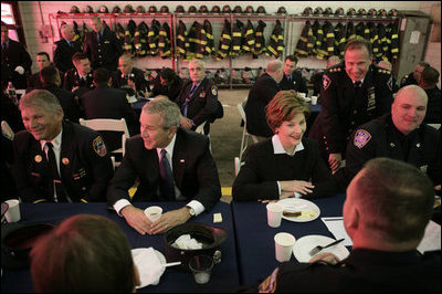President George W. Bush and Laura Bush join emergency first responders for breakfast Monday morning, Sept. 11, 2006 at the Fort Pitt Firehouse in New York City, during remembrance ceremonies marking the fifth anniversary of the Sept. 11, 2001 attacks.