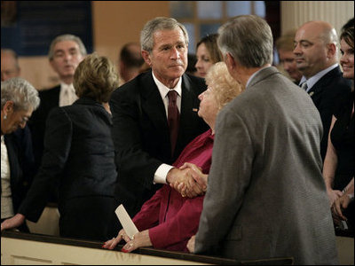 President George W. Bush talks with John and Jane Vigiano after the Service of Prayer and Remembrance at St. Paul’s Chapel near Ground Zero in New York City Sunday, September 10, 2006. The Vigiano family lost two sons, a police detective and a firefighter, in the terrorist attacks of September 11, 2001.