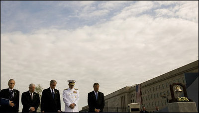 President George W. Bush is joined from left by former Secretary of Defense Donald Rumsfeld, U.S. Secretary of Defense Robert Gates, Chairman of the Joint Chiefs of Staff, Admiral Michael Mullen and James J. Laychak, chairman of the Pentagon Memorial Fund, Inc. as they bow their heads during a Moment of Silence Thursday, Sept. 11, 2008, at the dedication of the 9/11 Pentagon Memorial at the Pentagon in Arlington, Va.