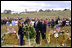 President George W. Bush and Mrs. Laura Bush participate in a wreath-laying ceremony near the site of the crash where seven crew members and 33 passengers died when the plane crashed in Somerset County. Officials believe the plane was heading for a target in Washington, D.C., when the passengers fought back against the four hijackers.
