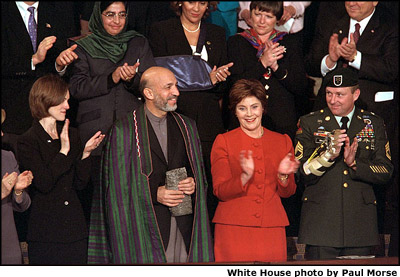 Chairman Karzai of Afghanistan receives a standing ovation during the address Jan. 29. White House photo by Paul Morse.