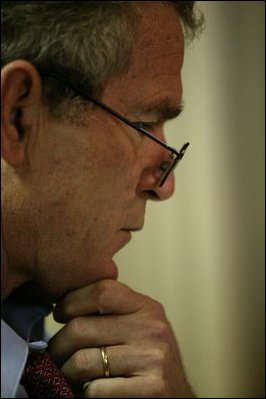 Working in the Family Theater of the White House, President George W. Bush reviews his speech the morning of his State of the Union Address Jan. 20, 2004.