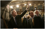 President George W. Bush waves to the audience Tuesday, Jan. 31, 2006, while leaving the U.S. House Chamber after delivering the 2006 State of the Union address.