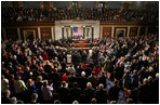 The House comes to its feet as President George W. Bush arrives at the podium Tuesday, Jan. 31, 2006, to give his State of the Union address.