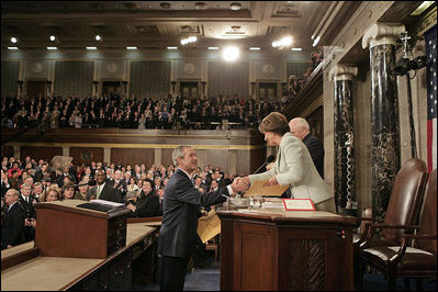 President George W. Bush greets Speaker of the House Nancy Pelosi before delivering his State of the Union Address at the U.S. Capitol Tuesday, Jan. 23, 2007.