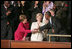 Mrs. Laura Bush and Lynne Cheney shake hands with Wesley Autrey during President Bush's State of the Union Address at the U.S. Capitol Tuesday evening, Jan. 23, 2007. "Three weeks ago, Wesley Autrey was waiting at a Harlem subway station with his two little girls, when he saw a man fall into the path of a train," said President Bush. "With seconds to act, Wesley jumped onto the tracks, pulled the man into the space between the rails, and held him as the train passed right above their heads. He insists he's not a hero. He says: 'We got guys and girls overseas dying for us to have our freedoms. We have got to show each other some love.' There is something wonderful about a country that produces a brave and humble man like Wesley Autrey."