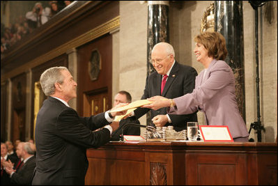 President George W. Bush delivers copies of his speech to Speaker of the House Nancy Pelosi (D-California) and Vice President Dick Cheney before delivering his 2008 State of the Union address Monday, Jan. 28, 2008, at the U.S. Capitol.
