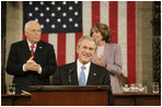 President George W. Bush smiles as he delivers his 2008 State of the Union address Monday, Jan. 28, 2008, at the U.S. Capitol.