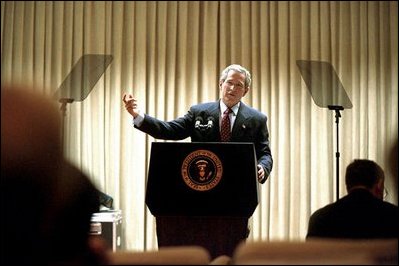 President Bush practices his address in the family theater of the White House Jan. 24, 2003.