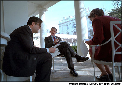 President Bush discusses some of the finer points of his upcoming State of the Union Address with Speechwriter Mike Gerson and Counselor Karen Hughes on the patio outside the Oval Office Jan. 29. White House photo by Eric Draper.