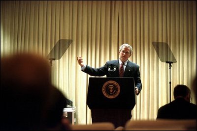 President Bush practices his address in the family theater of the White House Jan. 24, 2003.