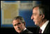 President George W. Bush listens to Argentina's President Nestor Carlos Kirchner as the two hold a joint press availability Friday, Nov. 4, 2005, at the Hermitage Hotel in Mar del Plata, Argentina.