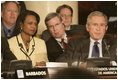 President George W. Bush, Secretary of State Condoleezza Rice and National Security Council Advisor Steve Hadley listen to opening statements Friday, Nov. 4, 2005, at the Summit of the Americas in Mar del Plata, Argentina.