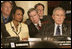 President George W. Bush, Secretary of State Condoleezza Rice and National Security Council Advisor Steve Hadley listen to opening statements Friday, Nov. 4, 2005, at the Summit of the Americas in Mar del Plata, Argentina.