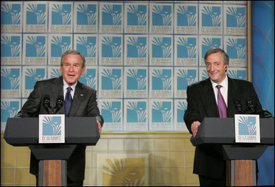 President George W. Bush and Argentina's President Nestor Carlos Kirchner smile as they hold a joint press availability Friday, Nov. 4, 2005, after meeting privately at the Hermitage Hotel in Mar del Plata, Argentina.