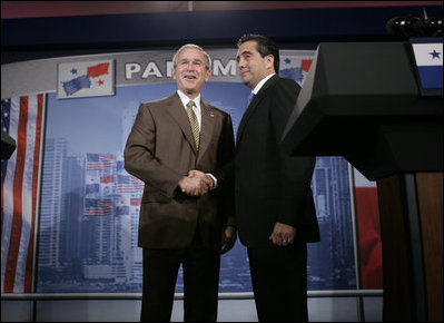 President George W. Bush greets President Martin Torrijos of Panama at the end of a joint press availability with the at Casa Amarilla in Panama City, Panama, Monday, Nov. 7, 2005. 