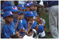 Action became a nail biter in the Memphis Red Sox dugout during a tee-ball game on the South Lawn May 6, 2001.