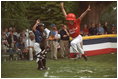 The Rockies score a run during a tee-ball game on the South Lawn May 6, 2001.