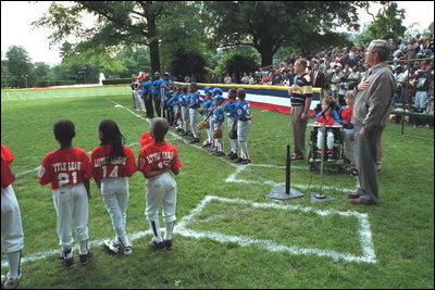 President George W. Bush starts the second Tee Ball game on the South Lawn on Sunday, June 3, 2001.