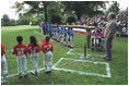 President George W. Bush starts the second Tee Ball game on the South Lawn on Sunday, June 3, 2001.