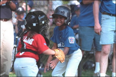The little leaguers were so eager that even getting tagged out was fun during the third Tee Ball game on the South Lawn on Sunday, July 15, 2001.