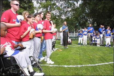 President George W. Bush hosts a White House Tee Ball (t-ball) game on the South Lawn between the Waynesboro, Virginia Little League Challenger Division Sand Gnats (Blue Team) vs. the East Brunswick, New Jersey Babe Ruth Buddy Ball League Sluggers (Red Team) September 22, 2002.