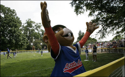 Dugout, the Little League mascot, celebrates the opening of the 2007 White House Tee Ball season Wednesday, June 27, 2007, during the opening game between the Luray, Virginia Red Wings and the Bobcats from Cumberland, Maryland. 