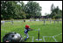 The game is on between the Inner City Little League of Brooklyn, N.Y. and the Wrigley Little League Dodgers of Los Angeles, all wearing the number 42 in honor of Hall of Fame player Jackie Robinson, at the White House Tee Ball Game on the South Lawn of the White House Sunday, July 15, 2007. Brooklyn and Los Angeles represent the two home cities of Robinson's team.