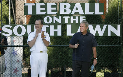 President George W. Bush is joined by Chairman of the Joint Chiefs of Staff, Admiral Michael Mullen, honorary Tee Ball commissioner, as President Bush welcomes the children of active-duty military personnel Sunday, Sept. 7, 2008, who are playing in the Tee Ball on the South Lawn: A Salute to the Troops game.