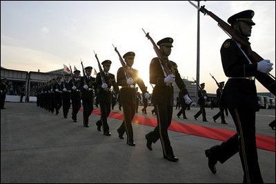 A Japanese honor guard marches out to greet the arrival of Vice President Cheney and Mrs. Cheney to Tokyo April 10, 2004. 