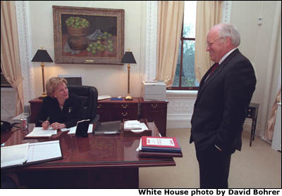 Taking a short break from work, the Vice President and Mrs. Cheney talk for a moment in her office. White House photo by David Bohrer.