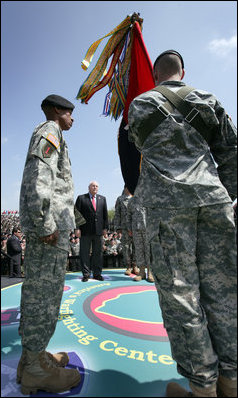 Vice President Dick Cheney participates in the awarding of the Valorous Unit Award to the First Brigade Combat Team, First Infantry Division during a rally for the troops at Fort Riley Army Base in Kansas, Tuesday, April 18, 2006.