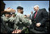 Vice President Dick Cheney greets soldiers at Fort Riley Army Base after delivering remarks at a rally for the troops, Tuesday, April 18, 2006.