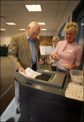 Vice President Dick Cheney casts his ballot, Tuesday, August 22, 2006, at the fire station in Wilson, Wyo. for the Wyoming state primary election. He and his wife Lynne Cheney voted early this morning. 