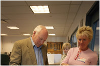 Vice President Dick Cheney casts his ballot, Tuesday, August 22, 2006, at the fire station in Wilson, Wyo. for the Wyoming state primary election. He and his wife Lynne Cheney voted early this morning. 