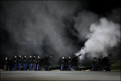 A 21-gun salute is given during the arrival of the casket of former President Gerald R. Ford at Andrews Air Force Base in Maryland, Saturday, December 30, 2006.