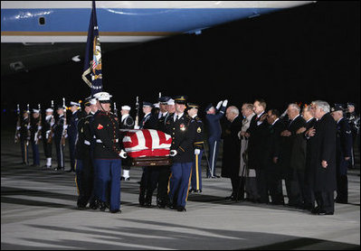 Vice President Dick Cheney leads the group of honorary pallbearers in saluting the casket of former President Gerald R. Ford upon its arrival at Andrews Air Force Base in Maryland, Saturday, December 30, 2006, for the State Funeral ceremonies at the U.S. Capitol.
