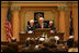 Vice President Cheney recounts his early days in politics during an address to a joint session of the Wyoming State Legislature in Cheyenne, Friday, February 17, 2006. “I would not be where I am today were it not for the friendship and the confidence of people all across this state,” the Vice President said. “It's always good to be home. And this morning, as an officeholder -- and, more than that, as a citizen of Wyoming -- I count it a high honor to be in such distinguished company.”