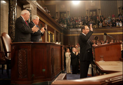 Prime Minister of Iraq Nouri al-Maliki responds to a welcome from Vice President Dick Cheney, House Speaker Dennis Hastert, and Congressional members before addressing a Joint Meeting of Congress, Wednesday, July 26, 2006, at the U.S. Capitol in Washington, D.C. Prime Minister Maliki, the first democratically elected prime minister of Iraq since the fall of Saddam Hussein, is on his first visit to Washington and met with President Bush yesterday to discuss the future development and security of Iraq.