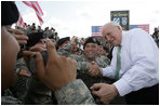 Vice President Dick Cheney shakes hands and poses for photographs with soldiers from the Army’s 3rd Infantry Division during a rally at Fort Stewart, Ga., Friday, July 21, 2006.
