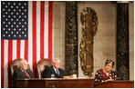 Vice President Dick Cheney and House Speaker J. Dennis Hastert listen as President Ellen Johnson-Sirleaf, Liberia and Africa’s first female head-of state, addresses a Joint Meeting of Congress held in her honor at the Capitol, Wednesday, March 15, 2006.