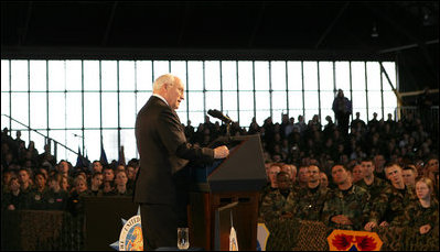 Vice President Dick Cheney participates in a rally with the troops at Scott Air Base, home of the US Transportation Command (USTRANSCOM), Tuesday, March 21, 2006. As the single manager of America's global defense transportation system, USTRANSCOM is tasked with the coordination of people and transportation assets that allows the US to project and sustain forces around the world. 
