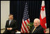 Vice President Dick Cheney and President Mikheil Saakashvili of Georgia, share a light moment with U.S. Ambassador John Tefft, right, during a bilateral meeting held during the Vilnius Conference 2006 in Vilnius, Lithuania, Thursday, May 4, 2006.