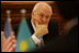Vice President Dick Cheney listens as leaders of Kazakh opposition political parties share their ideas regarding political and economic reform and the advancement of democracy in Kazakhstan, Saturday, May 6, 2006, during a breakfast meeting in Astana. 