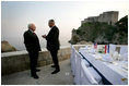 Vice President Dick Cheney talks with Croatian Prime Minister Ivo Sanader before a dinner meeting, Saturday, May 6, 2006, in the Old City of Dubrovnik, Croatia. The Vice President met with the Prime Minister to express U.S. support of Croatia's ambitions to become a member of the transatlantic community through integration into NATO and the European Community.