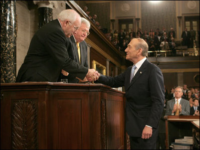 Vice President Dick Cheney congratulates Prime Minister Ehud Olmert of Israel, Wednesday, May 24, 2006, following the prime minister's remarks to a Joint Meeting of Congress at the U.S. Capitol. 