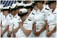 Midshipmen bow their heads during the Invocation at the Graduation and Commissioning Ceremony for the U.S. Naval Academy Class of 2006, Friday, May 26, 2006 in Annapolis, Maryland. During the ceremony Vice President Dick Cheney delivered the commencement address and awarded diplomas to the graduates.
